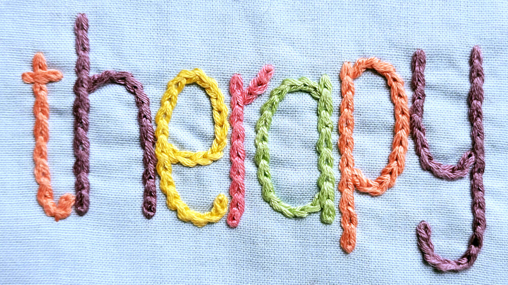 Embroidery as a Form of Therapy, an image having embroidery pattern that says therapy