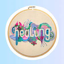 Embroidery as a Form of Therapy: Exploring the Healing Power of Stitching, an iamge having word healing in the embroidery pattern